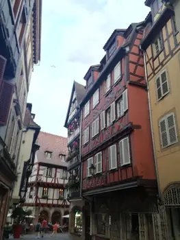 Folklore dancing in the evening at Colmar, Alsace (France)